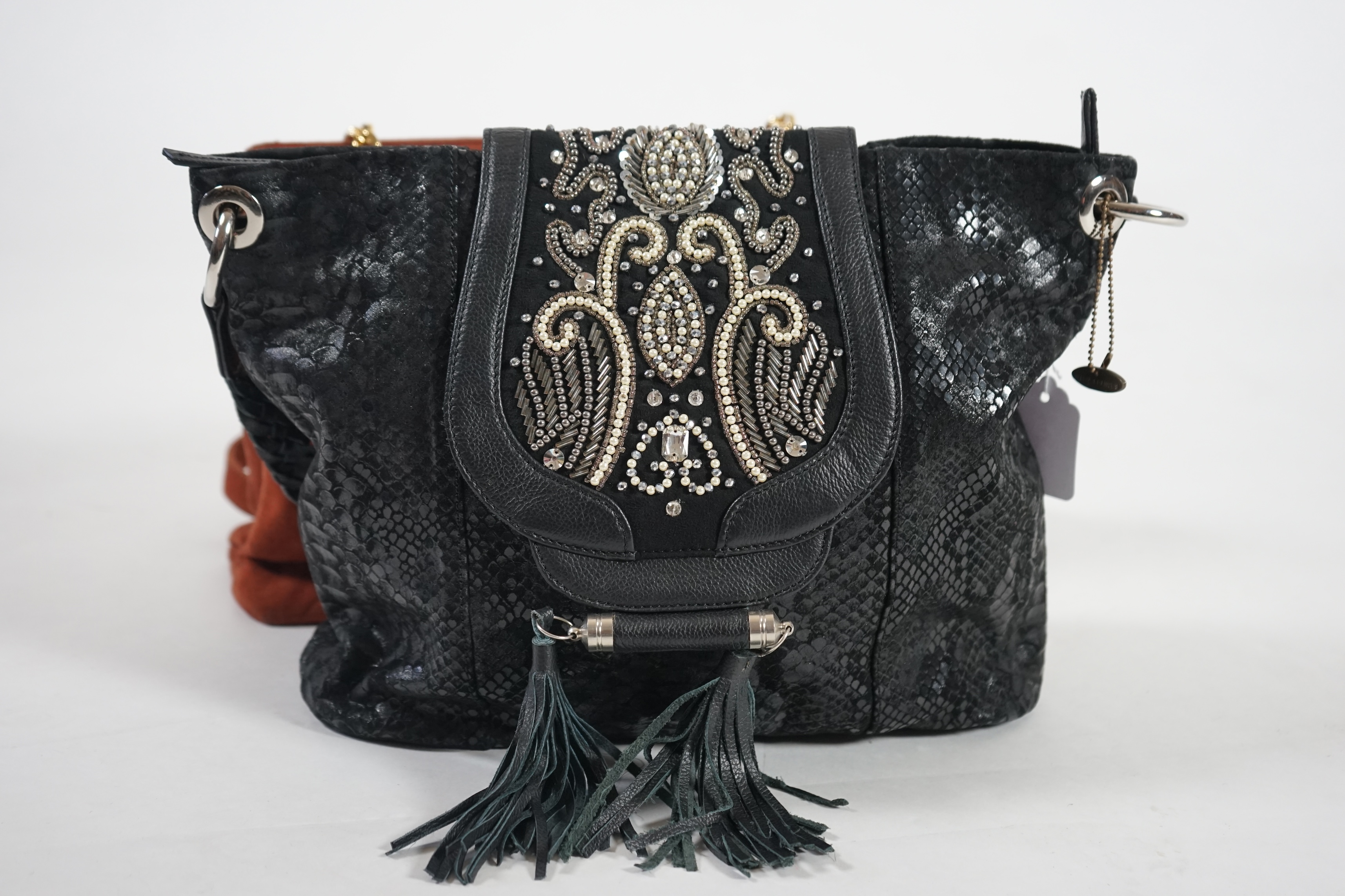 A selection of lady's handbags including a VERY Valentino black canvas bag with gold decorated chain handles, a Mary Frances black suede faux snake skin print shoulder bag with embellished fastening, a tan suede shoulder